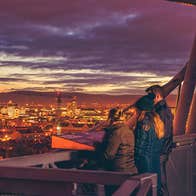 A group on the dusk tour at Croke Park over looking Dublin city