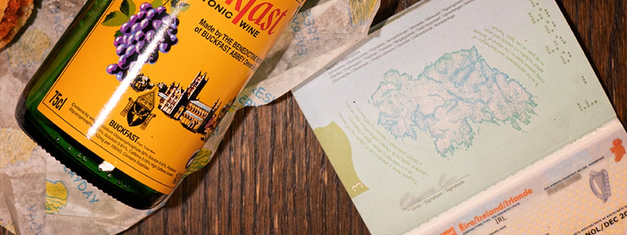 Bottle of Buckfast and an Irish passport