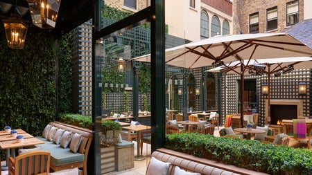 Outside dining area with tables and chairs
