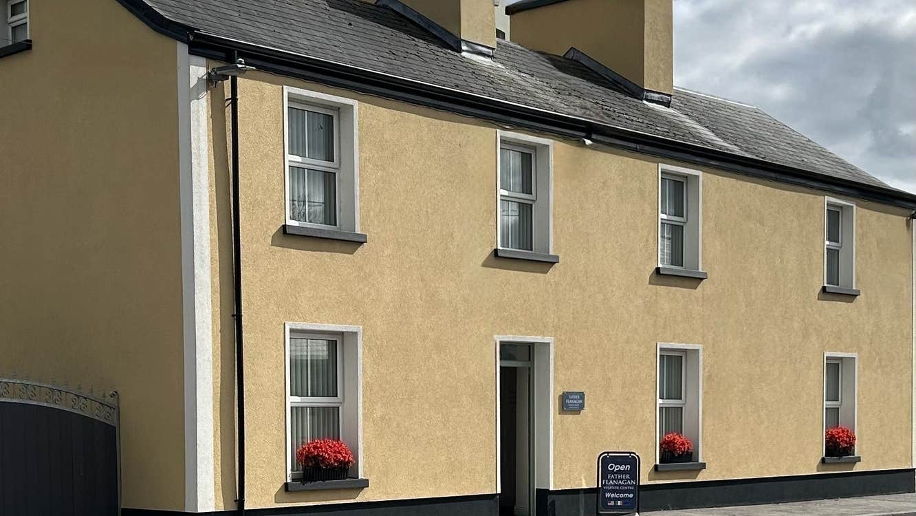 Exterior image of Father Flanagan Visitor Centre with a sign outside