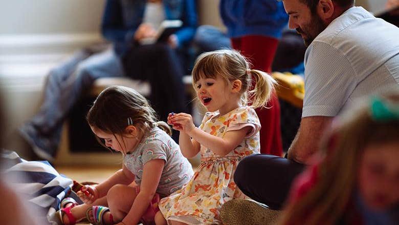 Image © Pimlico Project, 2 young girls are seated on a floor drawing