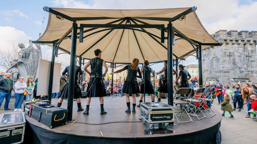 Band stand with dancers at St. Patrick's Festival in Kilkenny City.