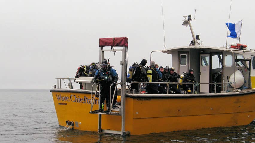 A dive group out at sea on the Wave Chieftain Aquaventures boat