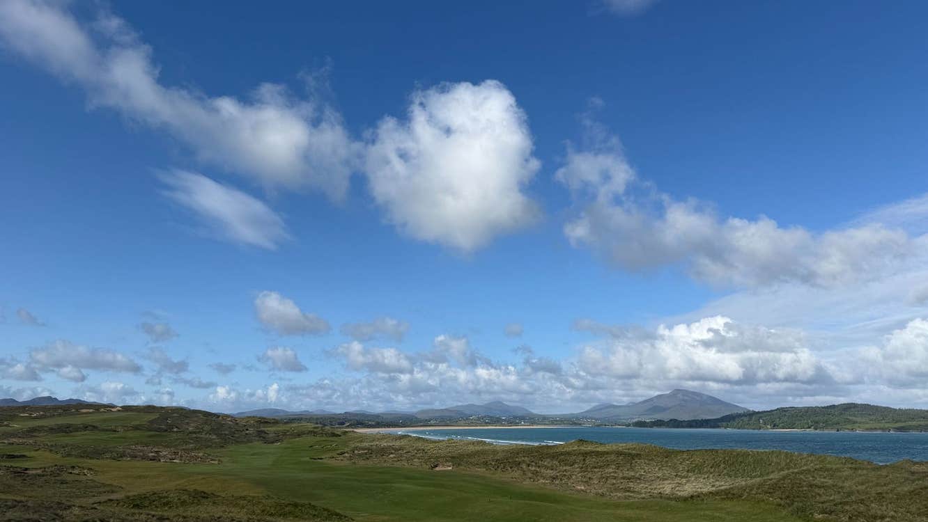 View from a rugged golf course onto the coast