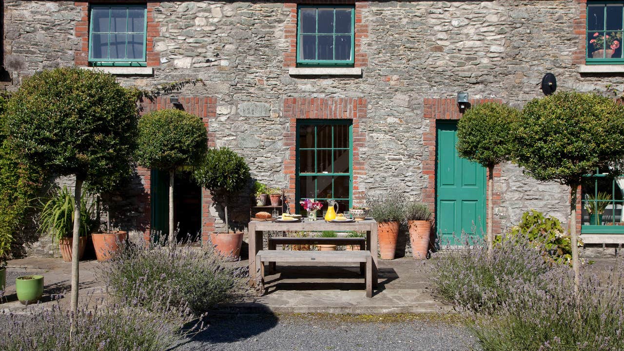 Front view of property with seating area