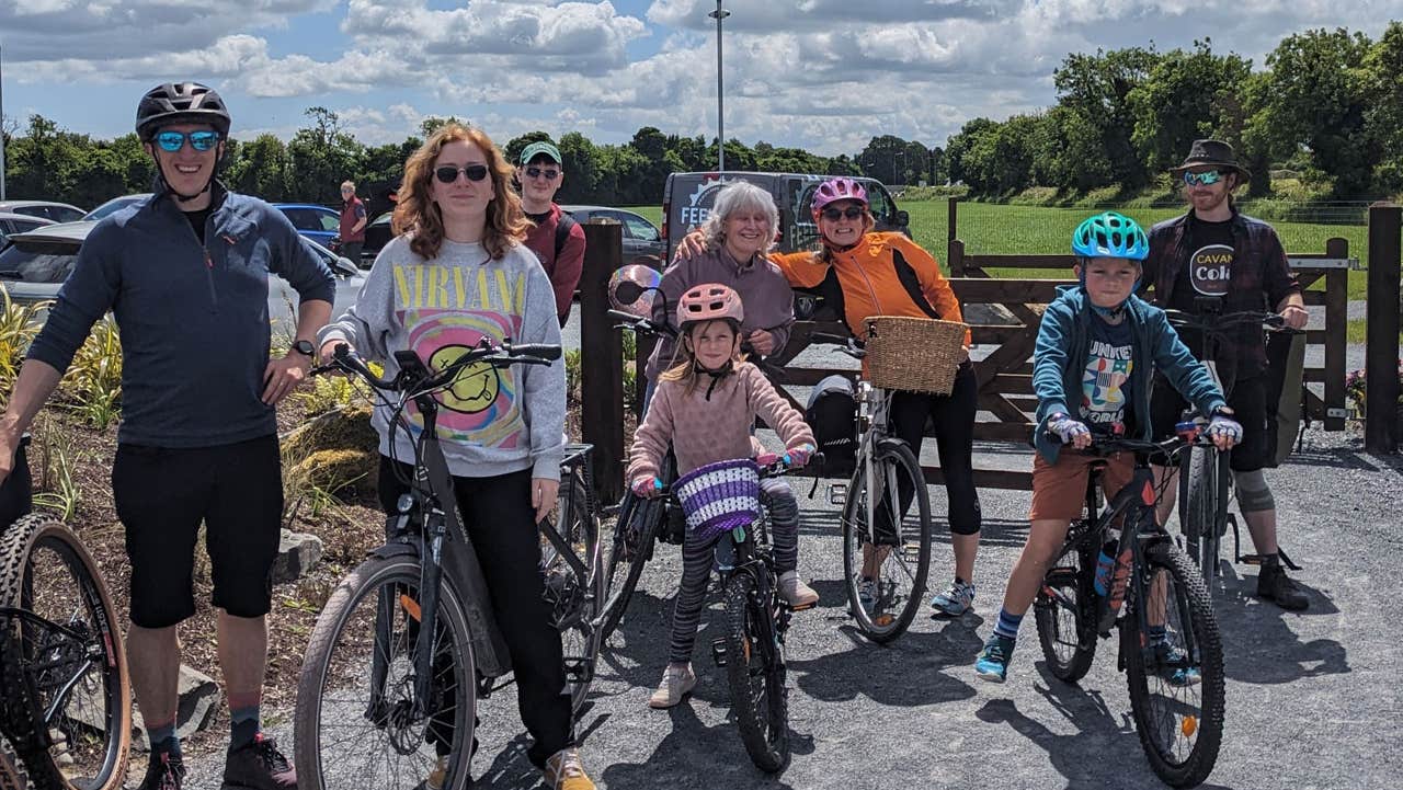 A family group about to set off and on a cycle tour