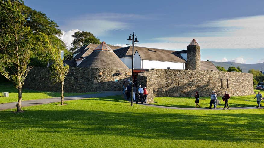 A group of people walking in to Siamsa Tire, the National Folk Theatre in Kerry.