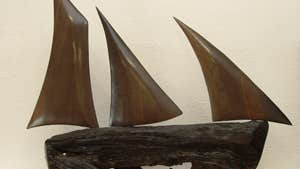 A sailboat carved from bogwood at Celtic Roots Studio, County Westmeath