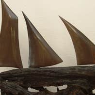 A sailboat carved from bogwood at Celtic Roots Studio, County Westmeath