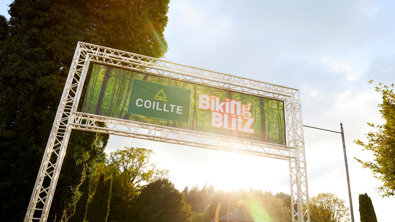 Slieve Bloom Mountain Bike festival. Starting arch for race with event poster across the top.