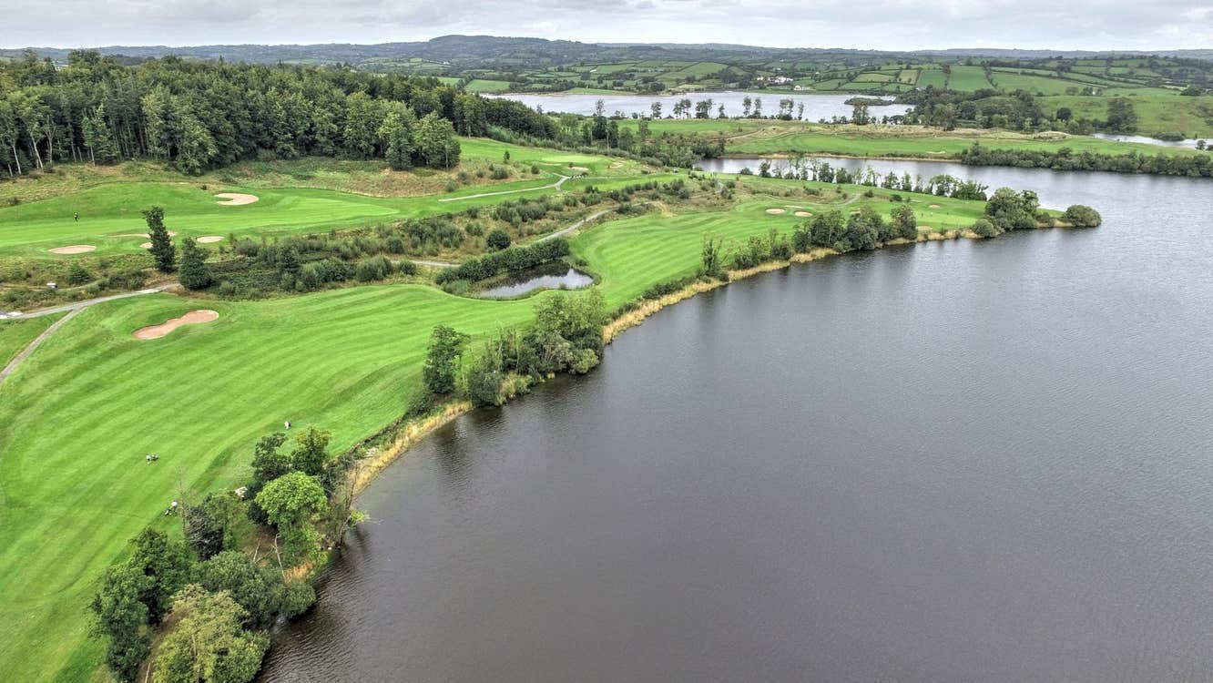 View of the lake and golf course at Concra Wood Golf and Country Club