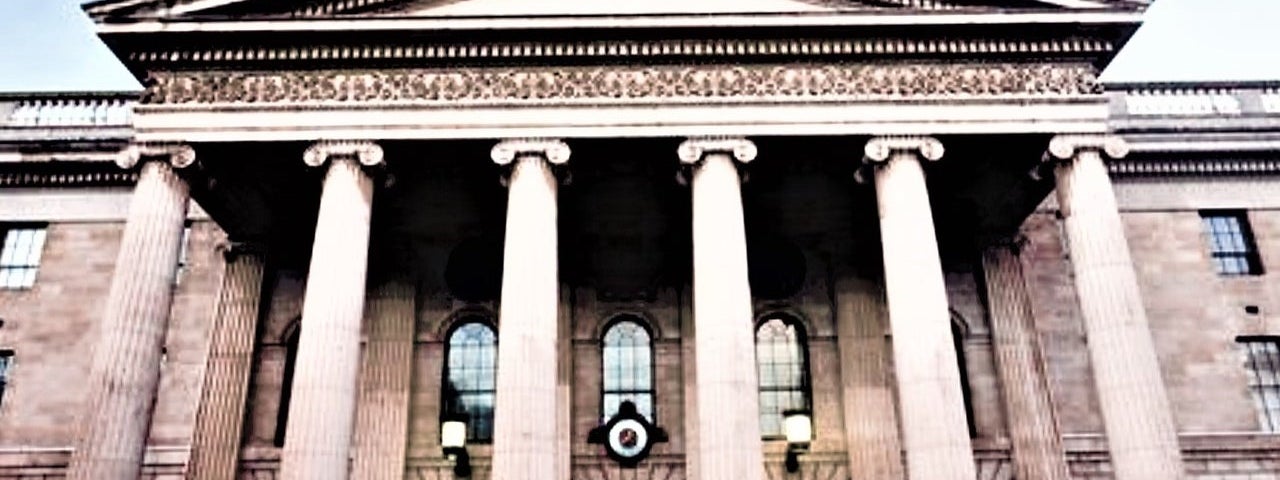Six pillars at the entrance to the GPO with Dublin History and Culture Private Walking Tours