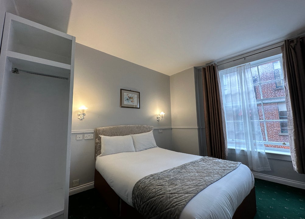 Double bedroom with white sheets