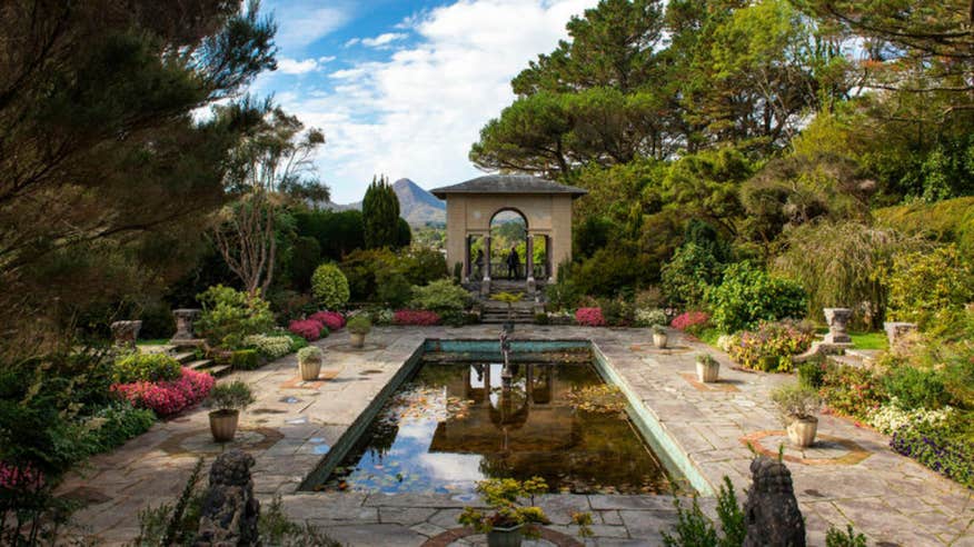 Colourful flowers and peacefuls pools in the courtyard on Garnish (Garinish) Island