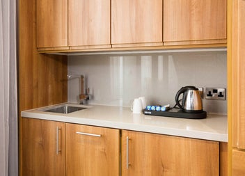 Kitchen with sink and kettle