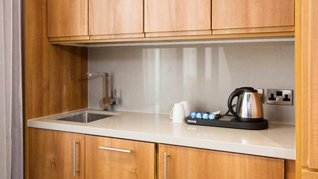 Kitchen with sink and kettle