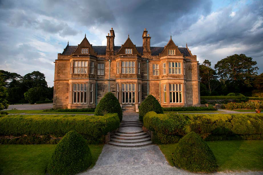 Visit Muckross House before walking to Torc Waterfall.