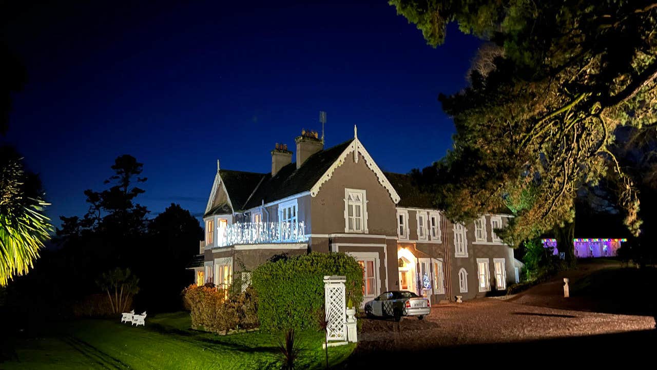 Front view of house at night