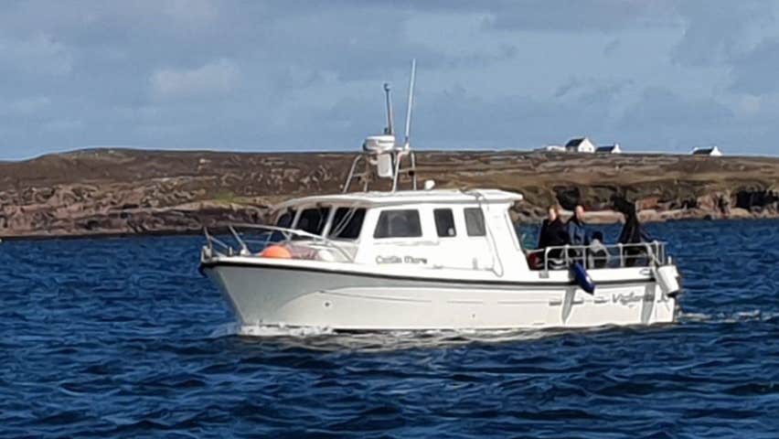 White fishing boat at Saoire Mara Charters Kincasslagh County Donegal