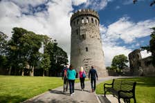 People walking up to Nenagh Castle in County Waterford