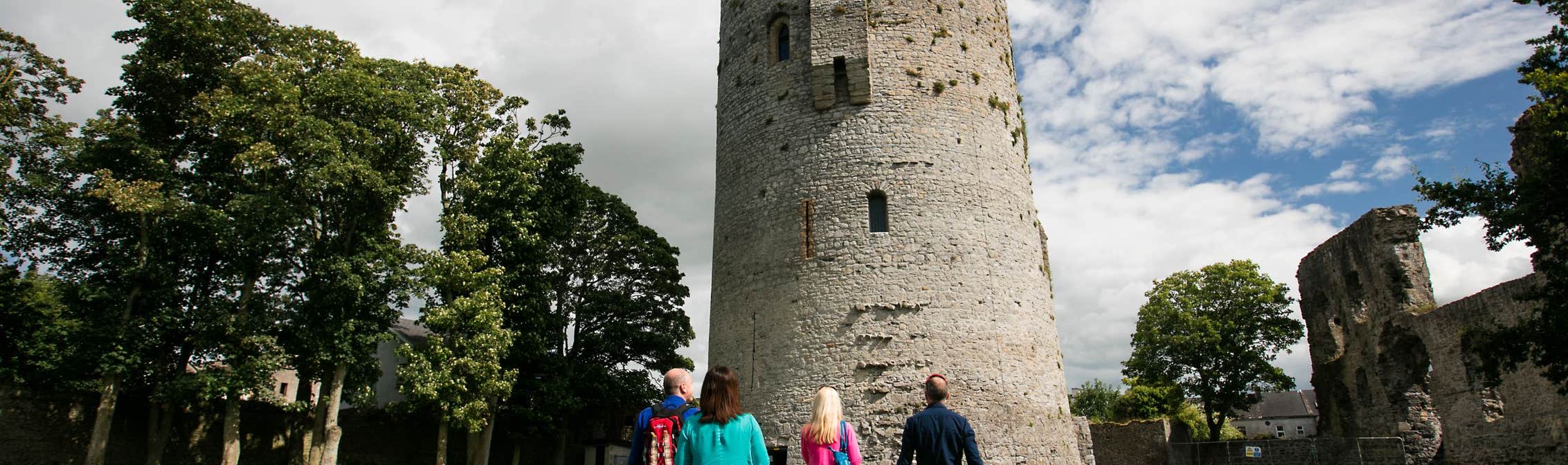 People walking up to Nenagh Castle in County Waterford