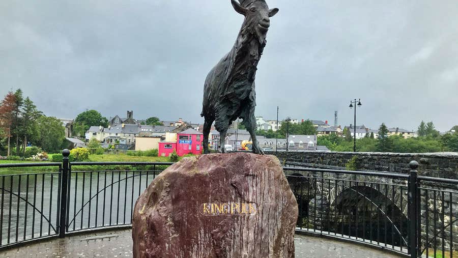 A view of the statue of King Puck on the approach bridge into Killorglin Town