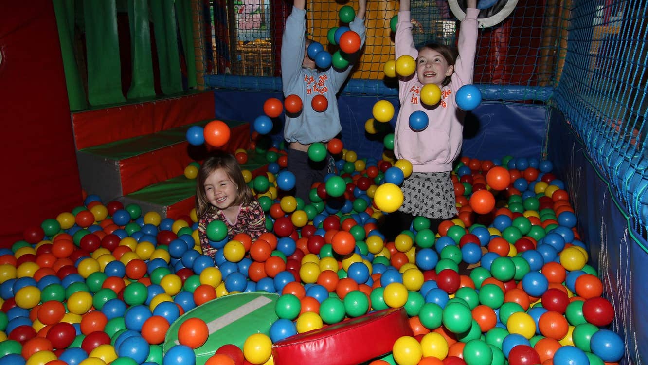 Children playing inside a ball pool at Monkey Business