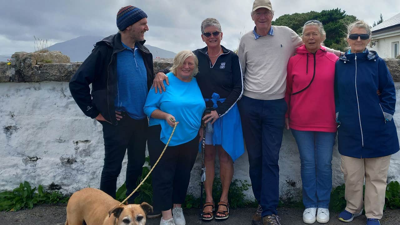 A group with their dog on tour with Really Great Tours