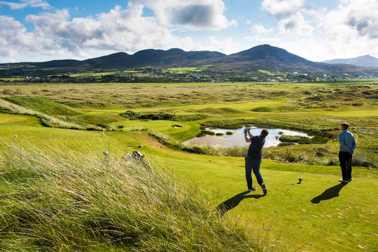 Golfers playing Ballyliffin Golf Course in County Donegal