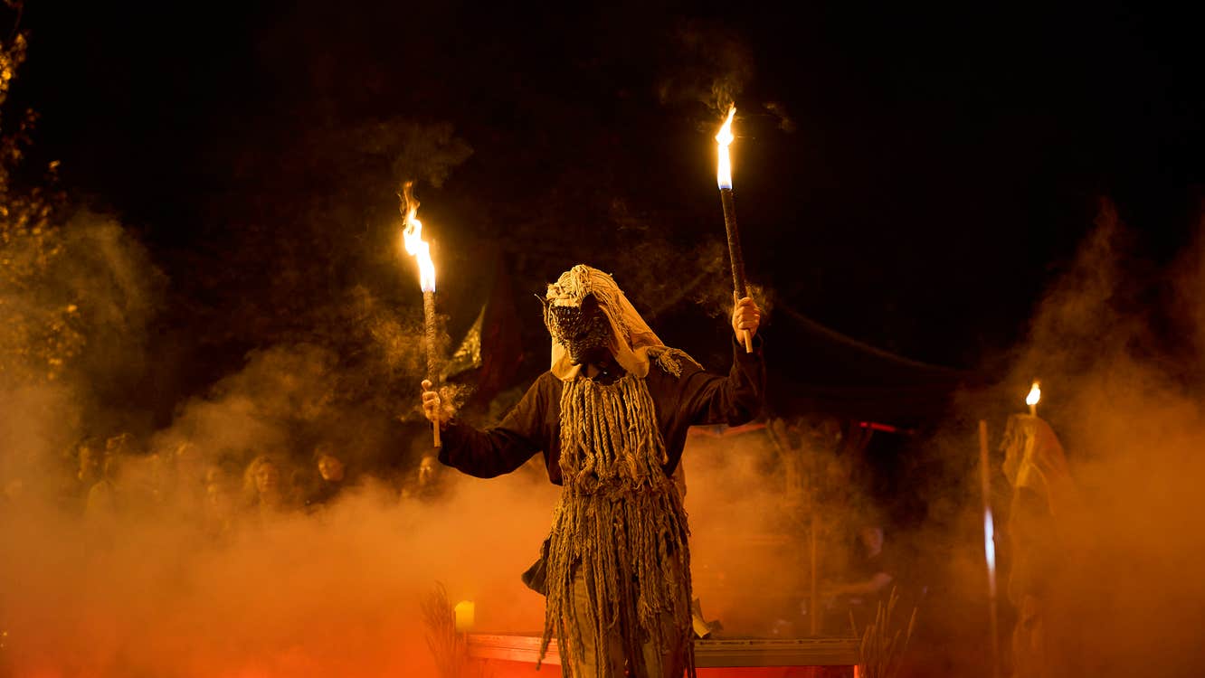 Masked performer at the Kerry Home Coming Festival.