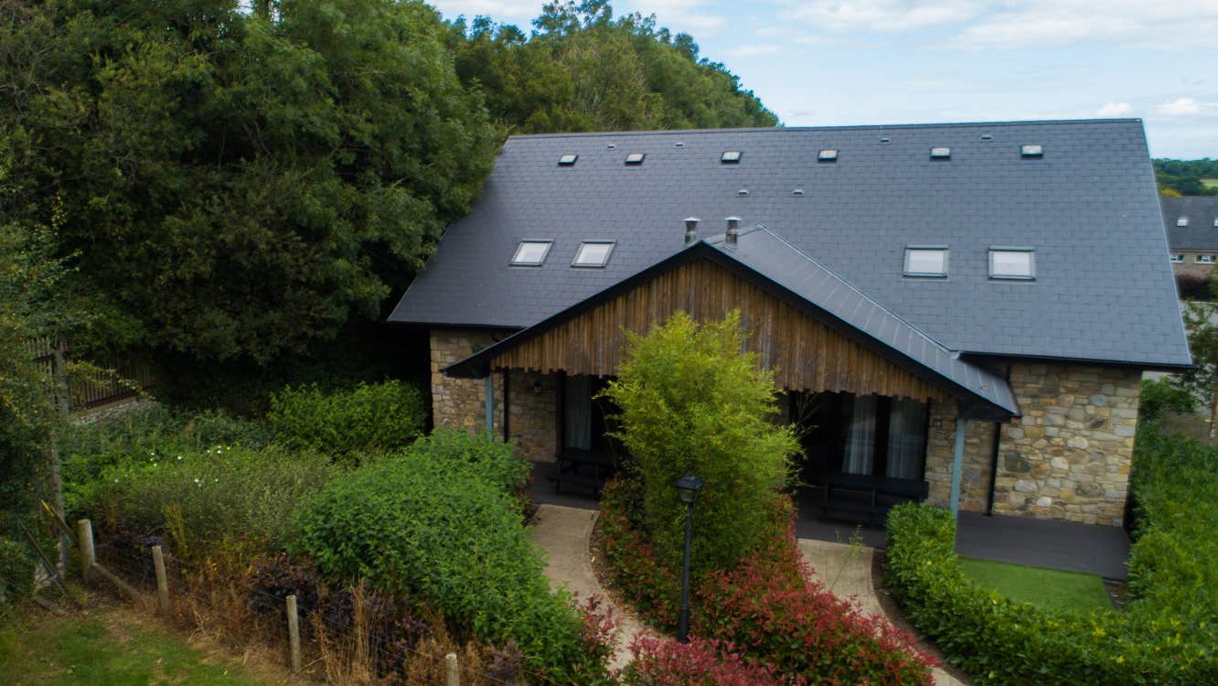 Exterior of accommodation on mature grounds.