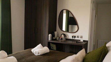 Bedroom with bed and seating area