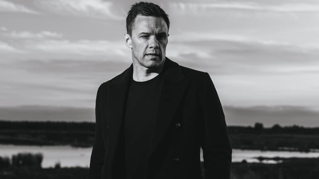 A black-and-white image of Niall Breslin. A bleak mood is suggested.