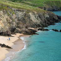 People on the golden sands of the Blasket Islands