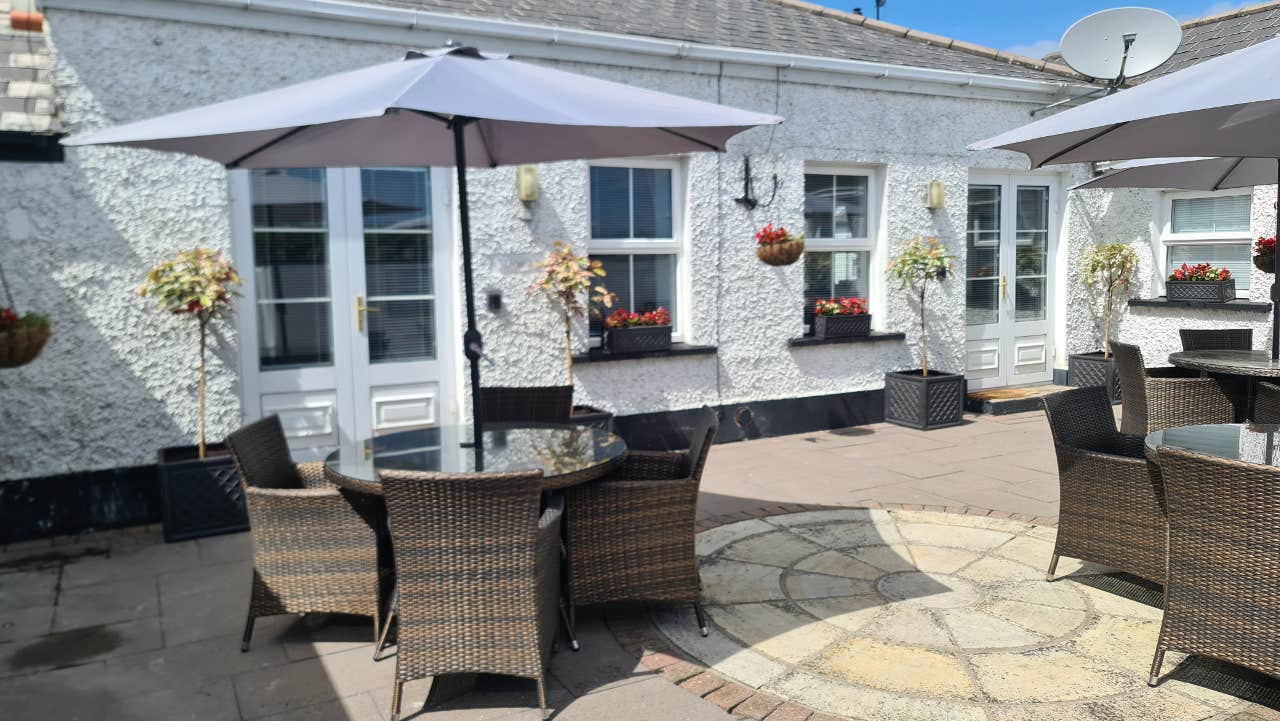 Outside seating area with table and chairs