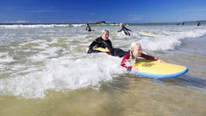 People taking surf lessons with Wild Atlantic Way Adventures in Co. Donegal