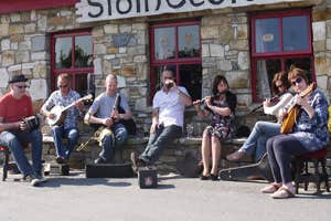 Musicians playing outside The Singing Pub