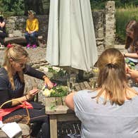 Blackstairs Eco Trails group of women making floral crowns