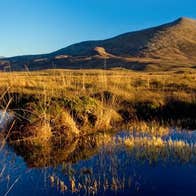 A reflection on the lake of the mountains within Ballycroy National Park