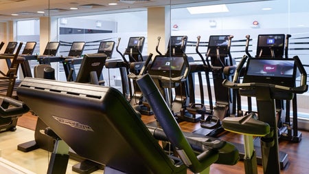 Spinning exercise machines in a gym