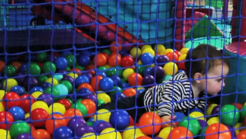 Infant playing in the ball pond at The Planet Entertainment Centre Cork City