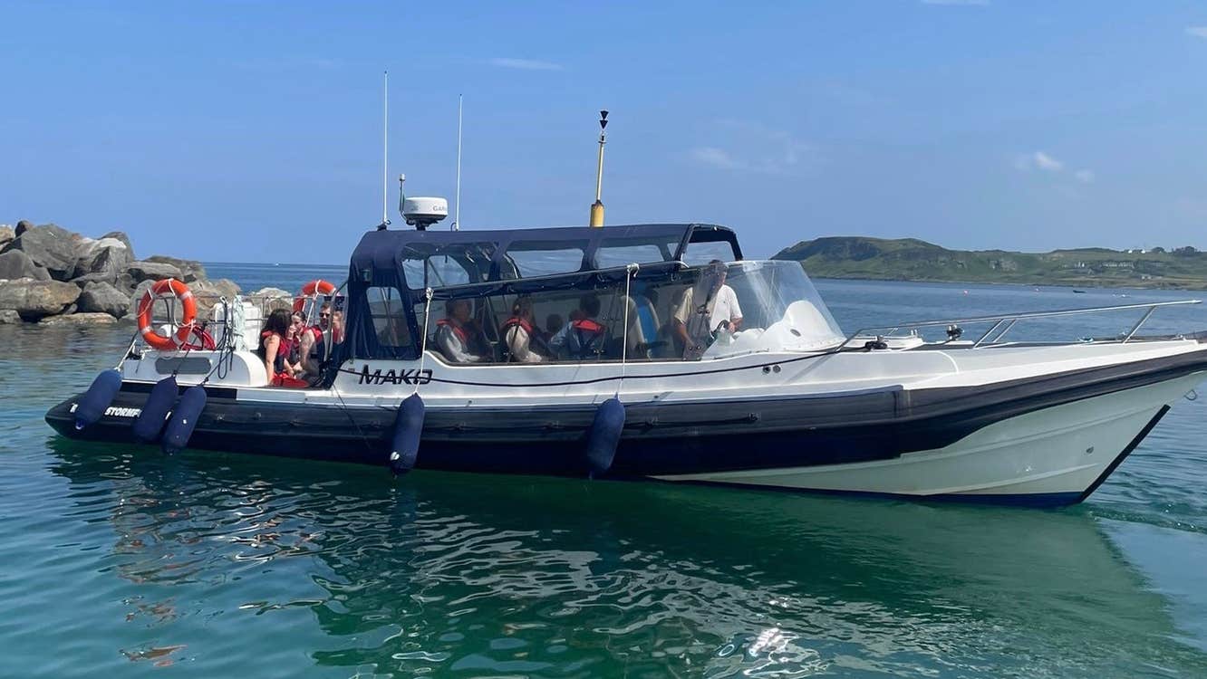 A True North Boating vessel prepares to depart on a coastal adventure from Culdaff