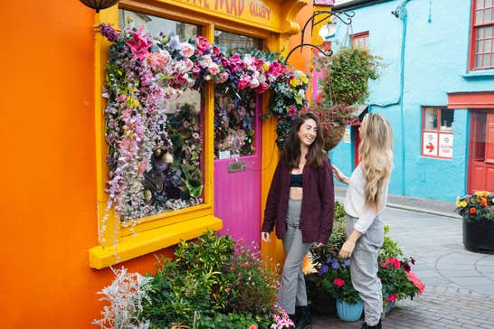 Two women exploring Kinsale in County Cork. 
