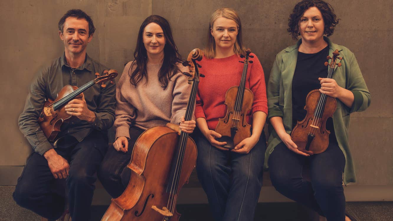 The members of the Banbha Quartet with their instruments.