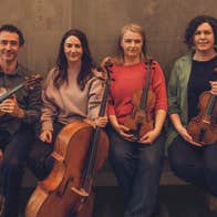 The members of the Banbha Quartet with their instruments.