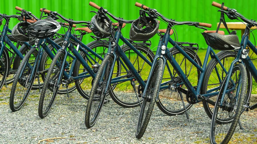A selection of bicycles with helmets at Limerick Greenway Bike Hire