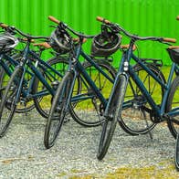A selection of bicycles with helmets at Limerick Greenway Bike Hire
