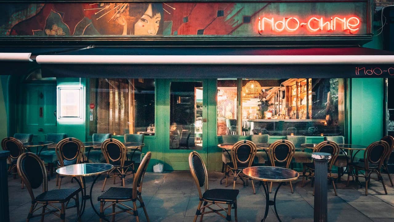 Exterior of a restaurant with an outside seating area