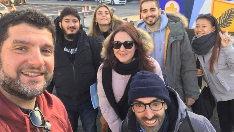 A selfie of a teacher and his students