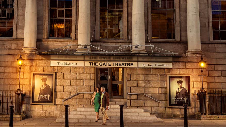 A couple leaving The Gate Theatre